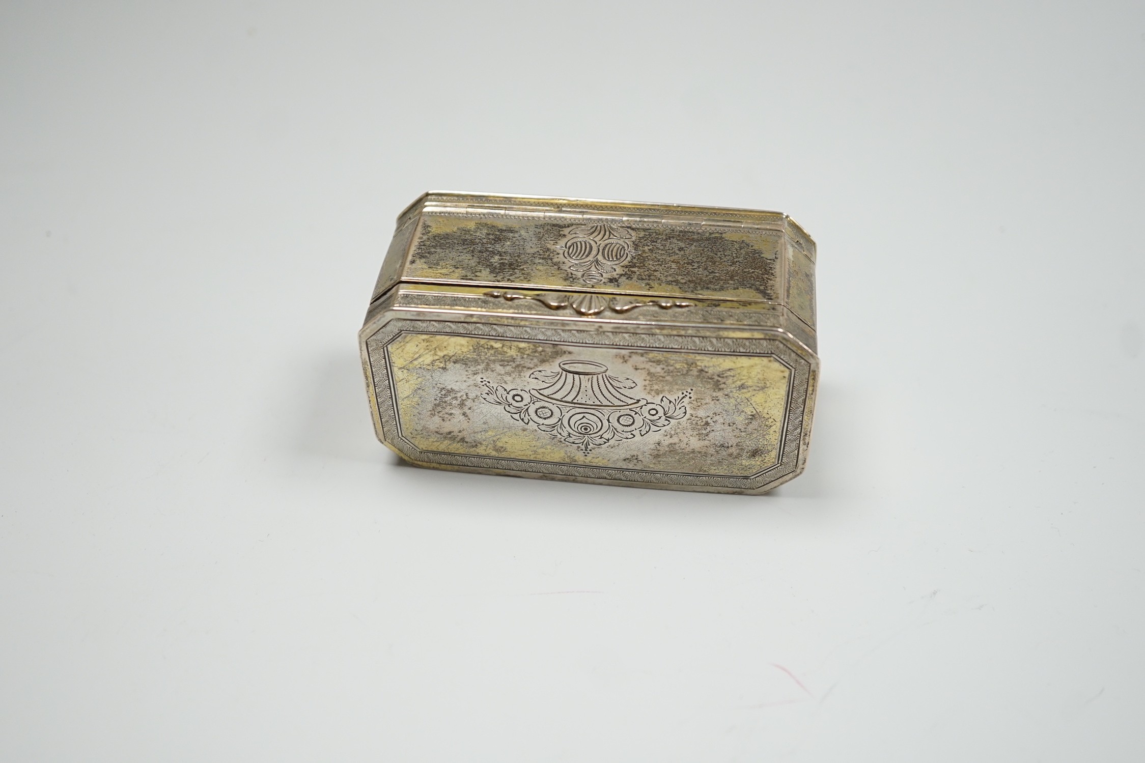 A 19th century German? engraved gilt white metal double hinged octagonal snuff box, 86mm.